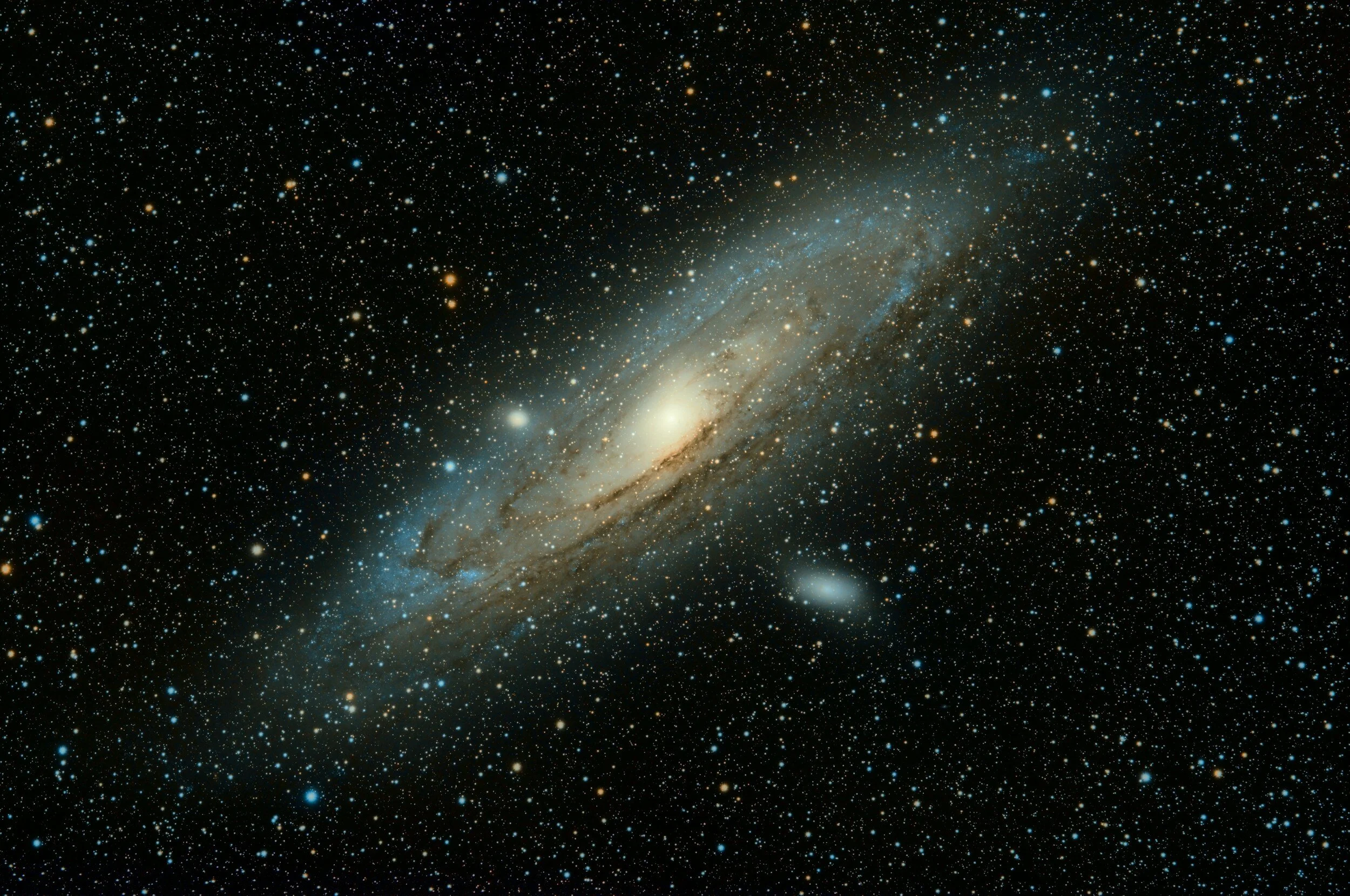 A spiral galaxy glowing at its radiant core, surrounded by a field of distant stars — an image of feeling spiritually connected to something larger than yourself.